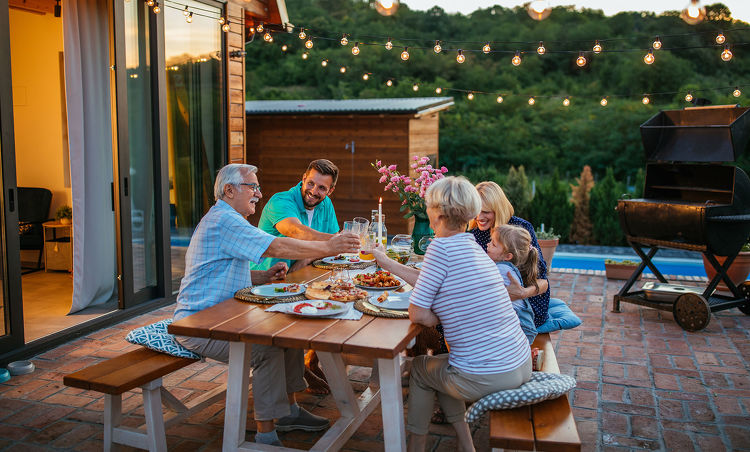 Family enjoying dinner outdoors